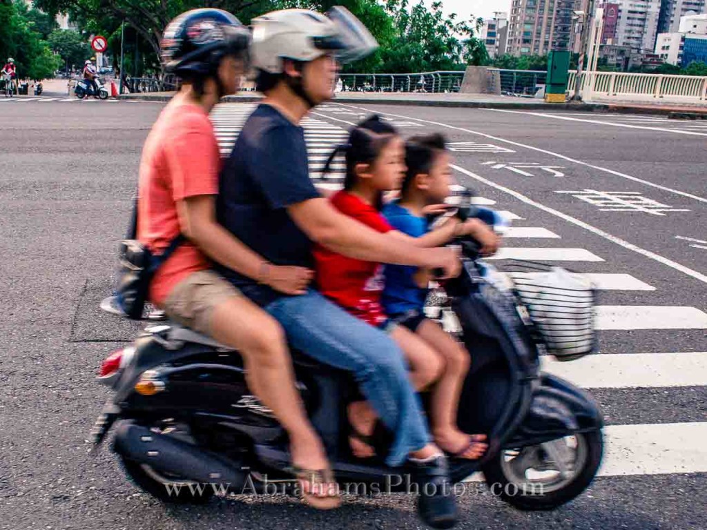 Family Riding a Scooter Kaohsiung City Taiwan